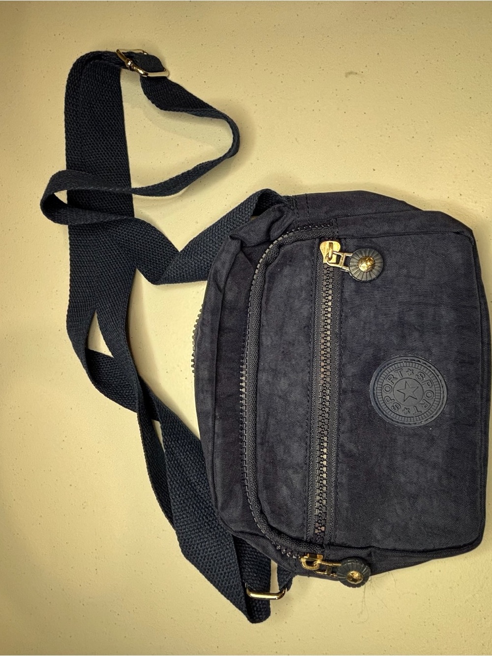 Black Crossbody Bag with Gold Accent - Sporty Casual Style